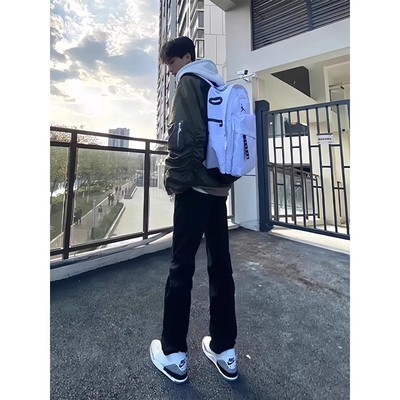 纯黑色微喇牛仔裤男款秋冬