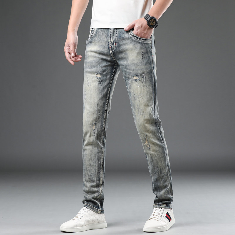 2026年春夏复古弹力牛仔裤男潮牌修身小脚青年长裤子怀旧帅气破洞