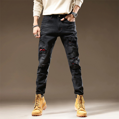 潮牌针缝牛仔裤男款拼接贴布修身小直脚裤重工刺绣痞帅个性长裤