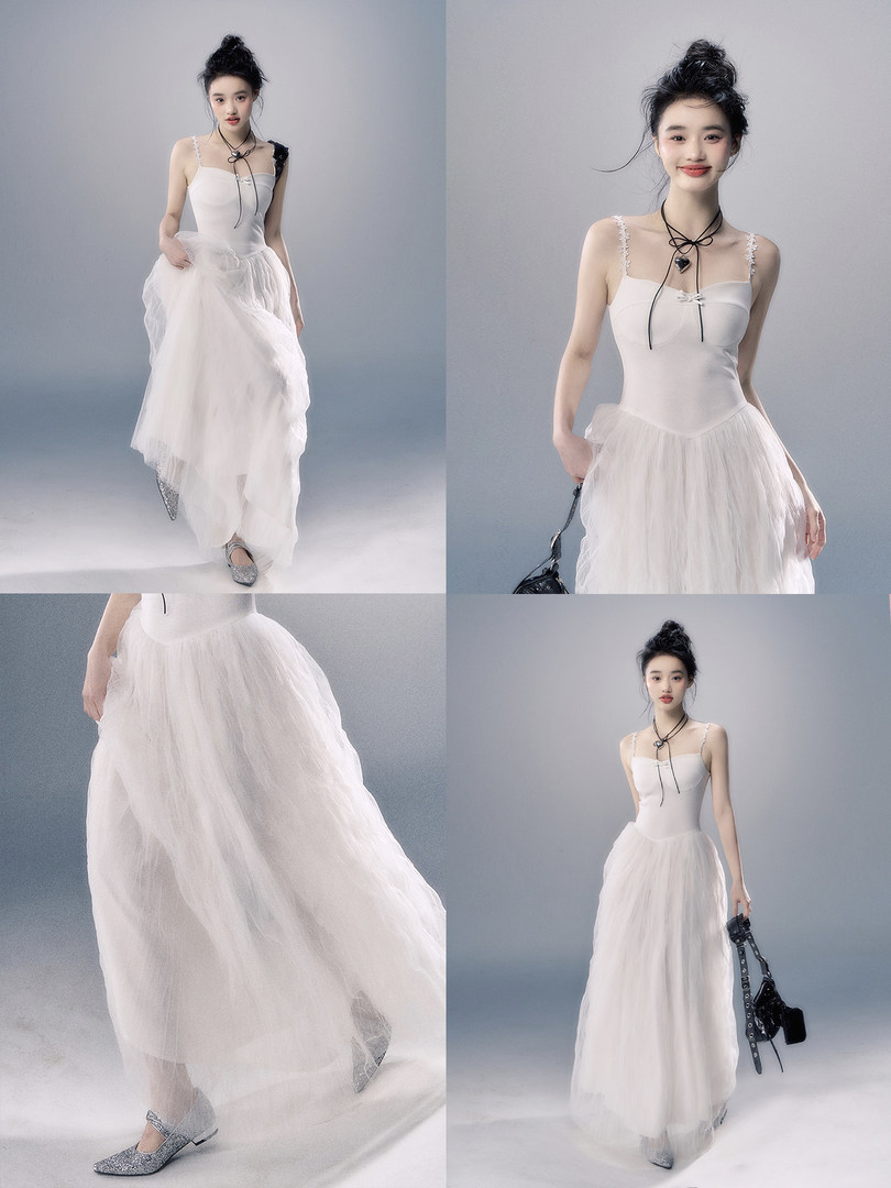 White strapless tulle dress worn by a model