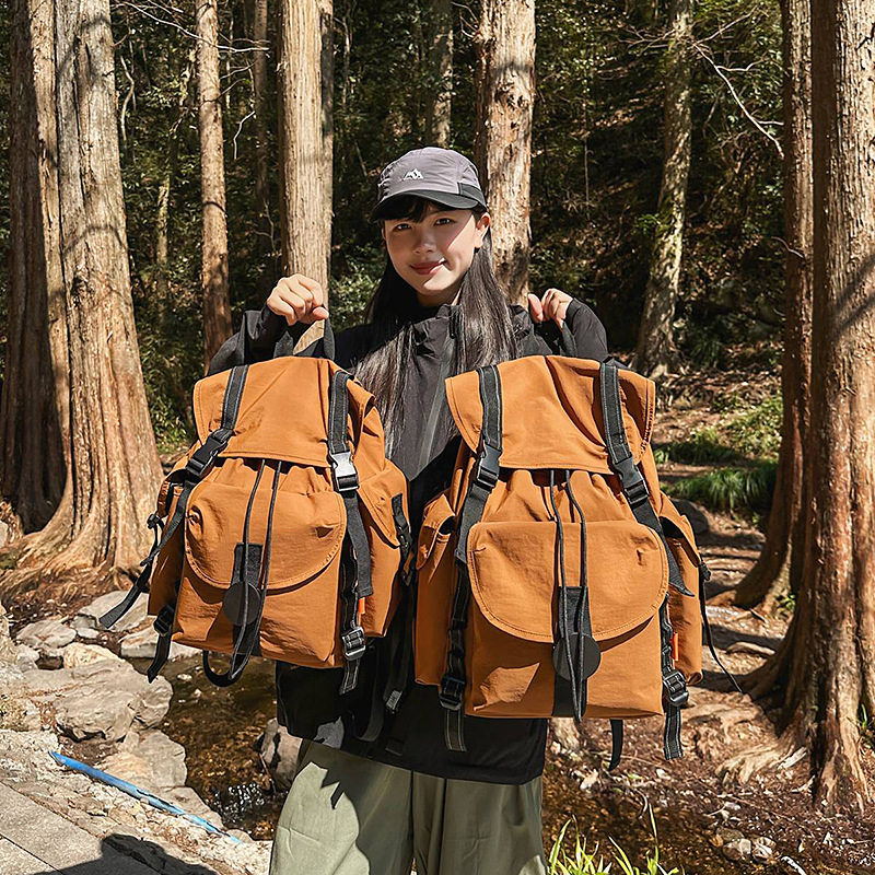 登山旅行背包男女户外休闲潮流大学生书包初中生高中生轻便双肩包