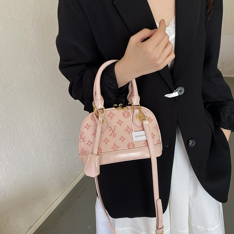 高颜值贝壳手提包包女2026新款质感百搭压花时尚单肩斜挎包潮