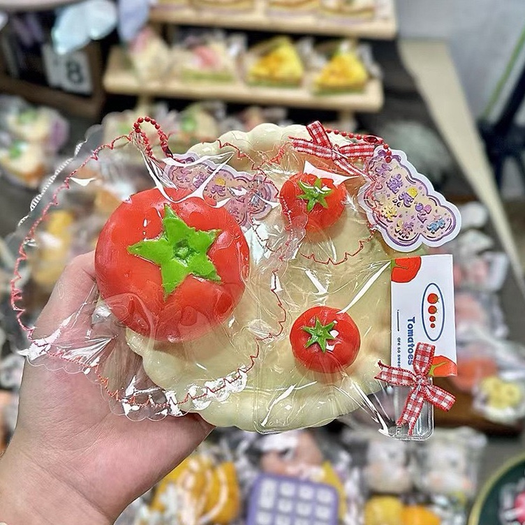 泥感西红柿迷你和大号款硅胶捏捏乐水果缝边款包包挂件解压玩具