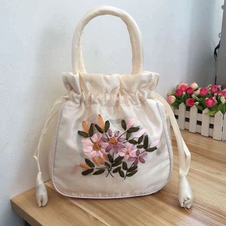 手提包女小包手拿包民族风绣花包妈咪包女士水桶包抽带汉服手机包