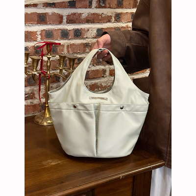 韩系休闲褶皱双口袋单肩包女2025新款大容量手提托特包菜篮子包包