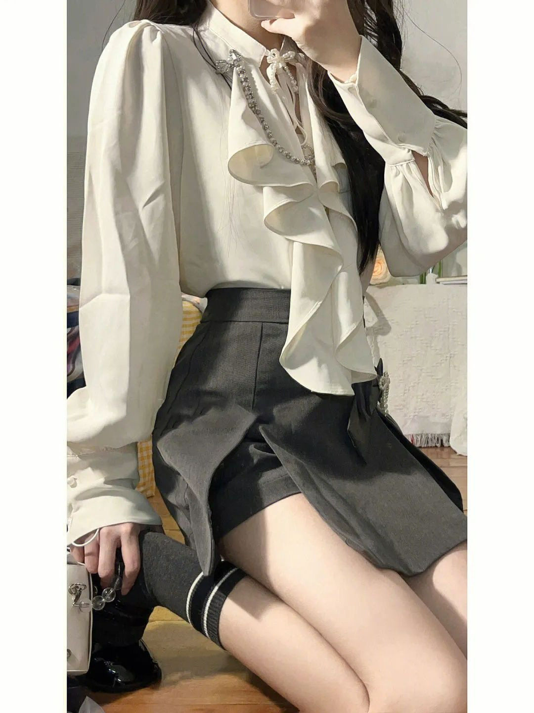 早春季女气质高级感轻熟风御姐港半身裙