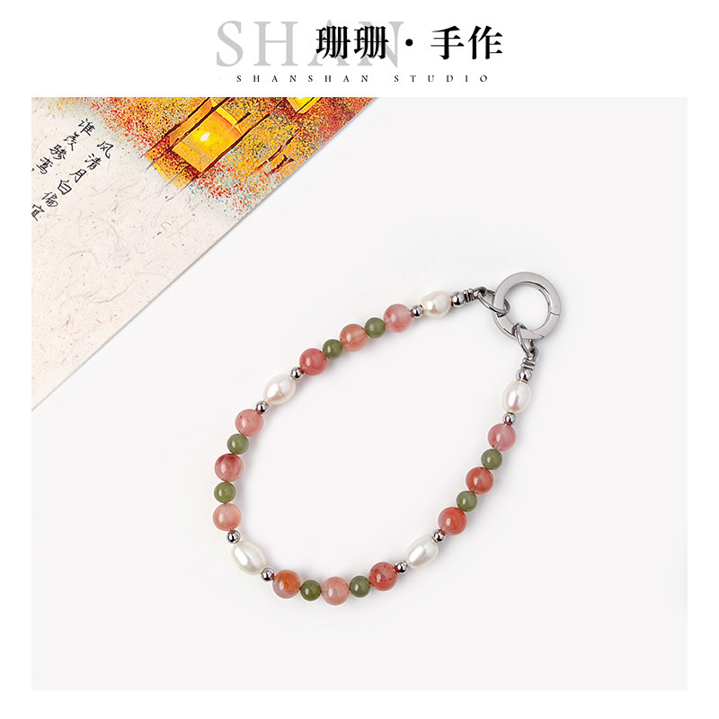 天然和田玉手机链珍珠手拿链冰飘南红腕链包包挂件手链高端精致女