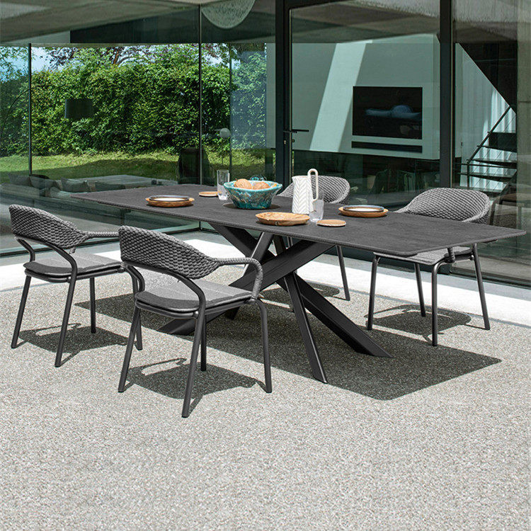 北欧户外休闲餐桌椅组合庭院花园民宿网红藤编椅设计师岩板烧烤桌