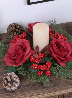 Christmas wreath decorated with red berries, candle holder,
