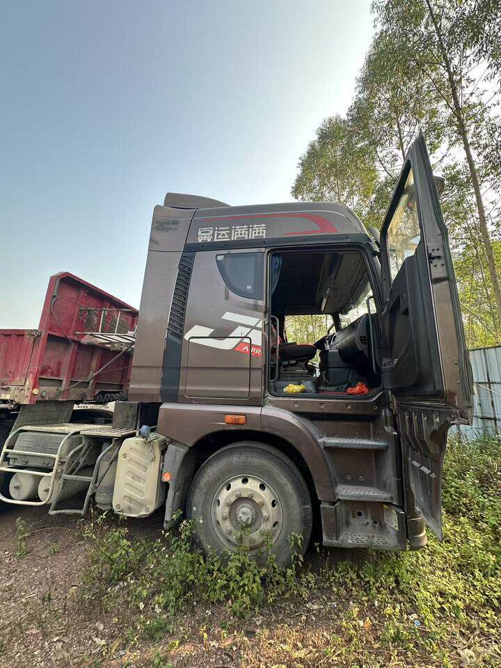 3月24日贺州市变卖桂J17261号的解放牌重型半挂牵引车、桂J4481挂的广科牌重型平板半挂车网络拍卖公告