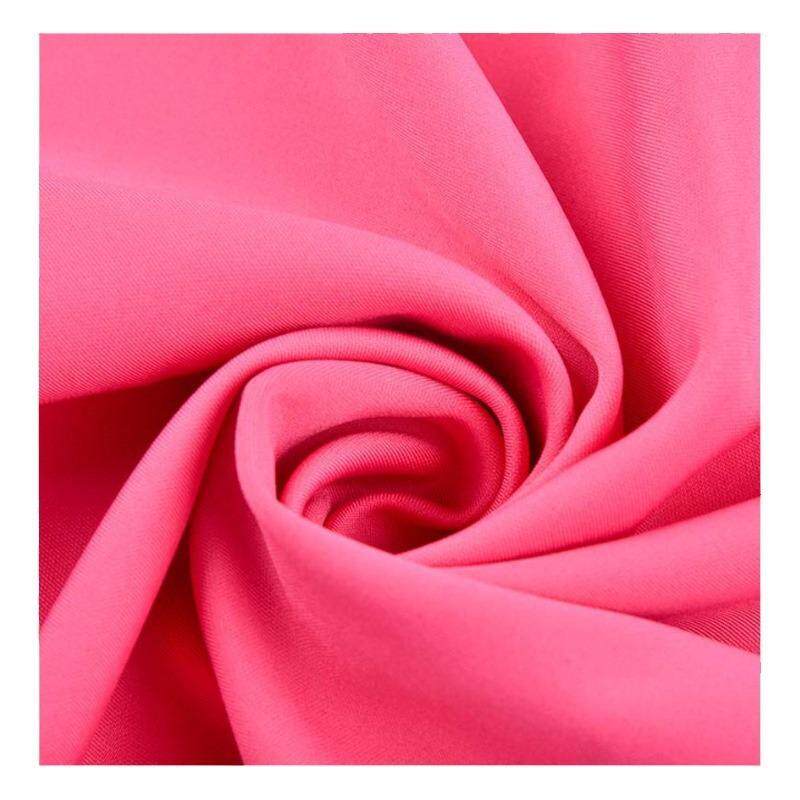 春夏全涤弹力加捻罗马布涤纶针织面料 休闲裤哈伦裤布料抗起爆款