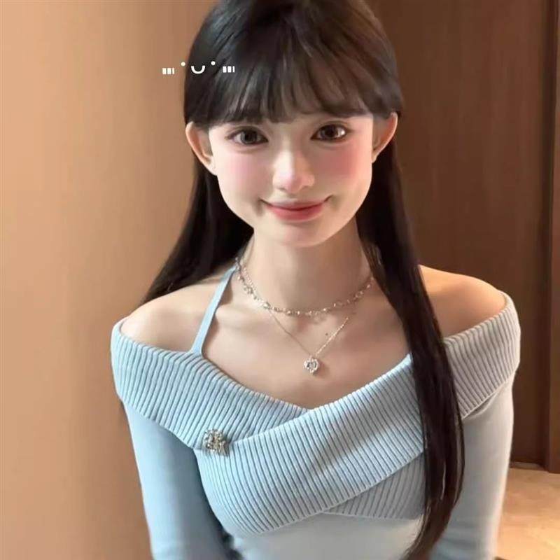 韩系蓝色一字肩挂脖针织衫女秋季设计感小众交叉修身显瘦短款上衣