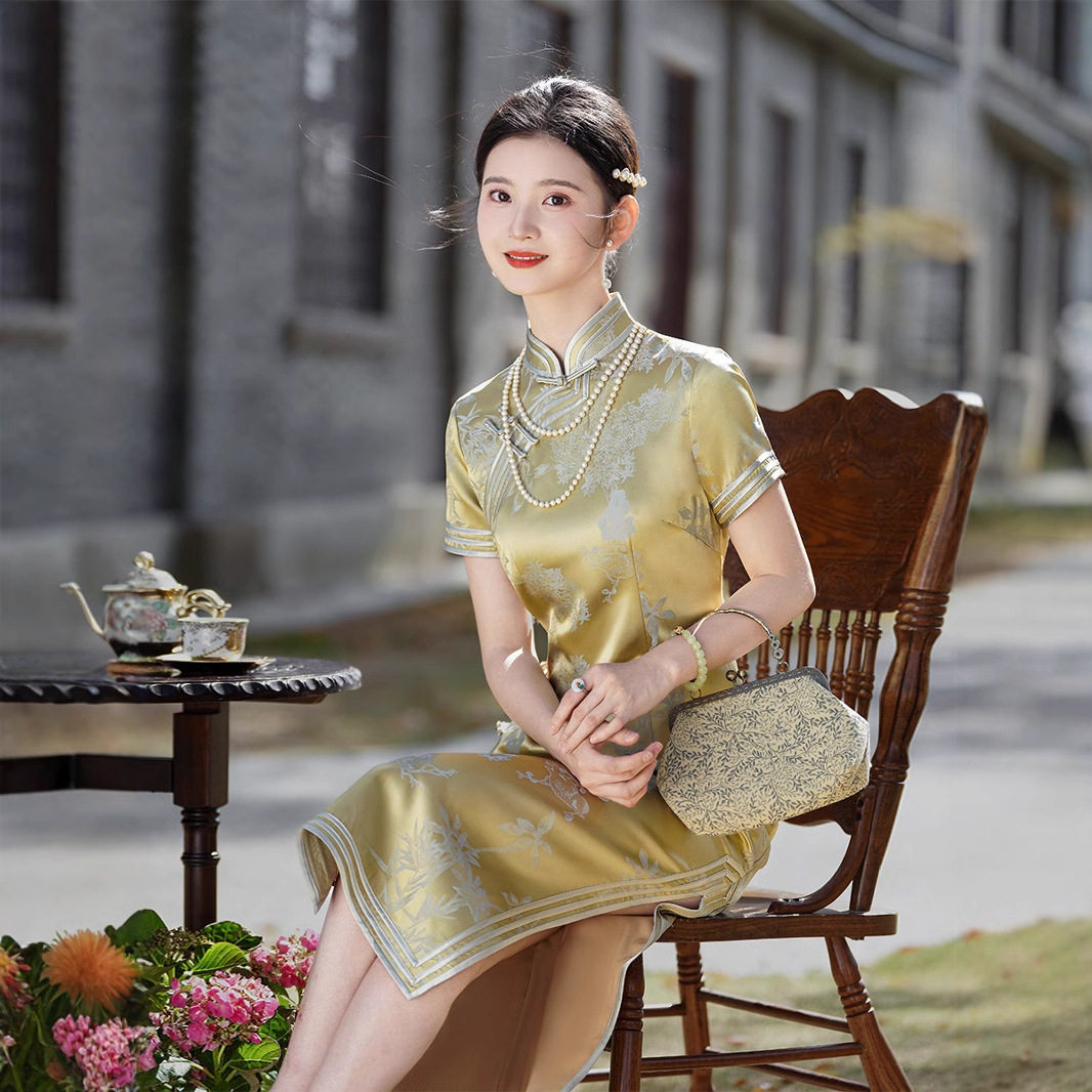 桑蚕丝感改良旗袍金色真丝交织连衣裙气质提花缎长款2026新款礼服