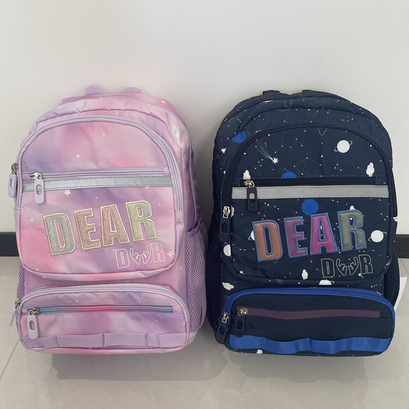 撤柜小学生书包大容量肩负护脊男女生儿童卡通双肩包1-6年级背包