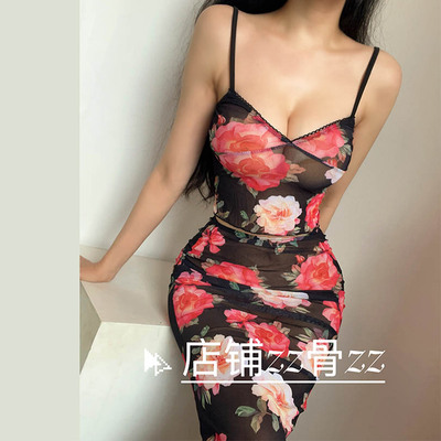 ZZ骨ZZ新款欧美时髦沙滩度假风V领印花半透明背心+半身裙时尚套装