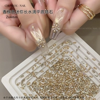 50 цирконов в виде капель воды цвета шампанского 2*4 мм.