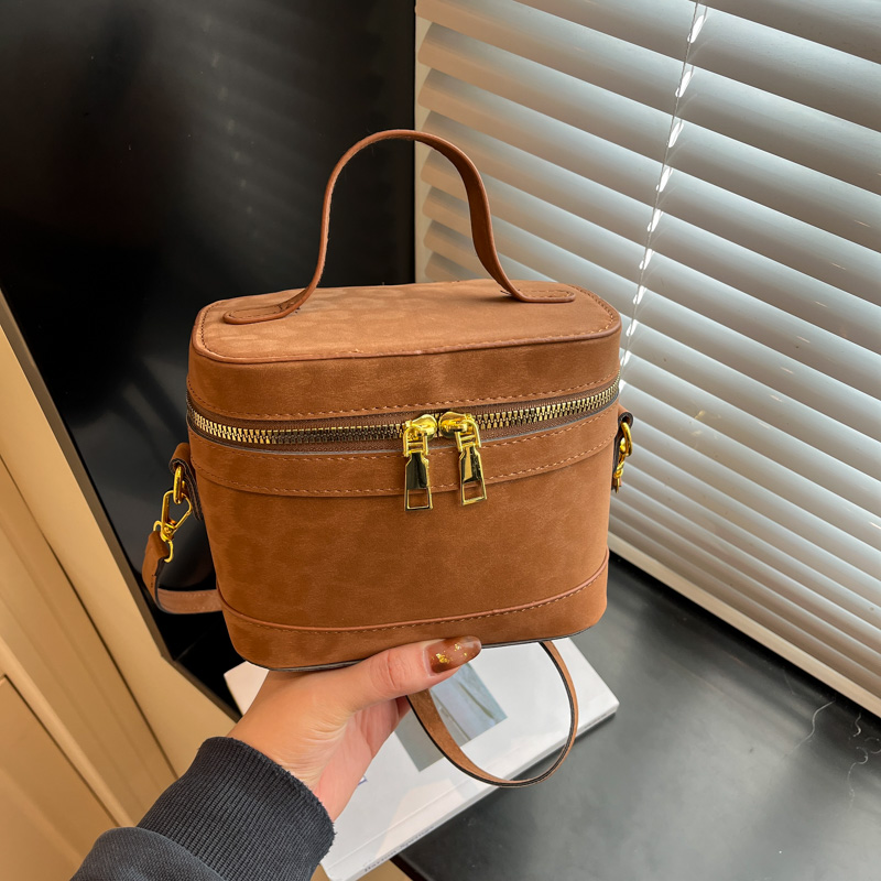 春夏百搭斜挎包手提撞色水桶包