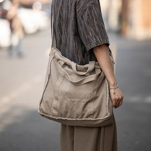 贰狸水洗个性毛边大容量工装破碎感百搭帆布托特包单肩手提斜挎包