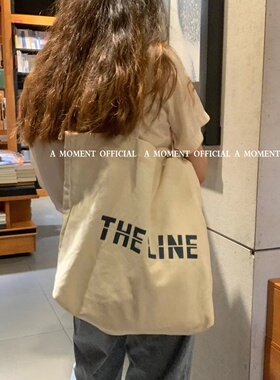 A moment official_大容量通勤单肩帆布包慵懒风购物袋百搭帆布袋