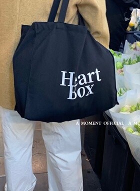 A moment official_春季新款单肩帆布手提袋 INS博主同款英文字母