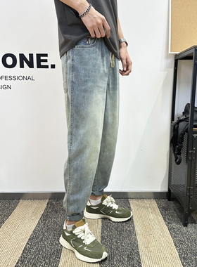 休闲牛仔裤男款2025春夏新款宽松哈伦裤水洗工艺九分小脚裤弹力