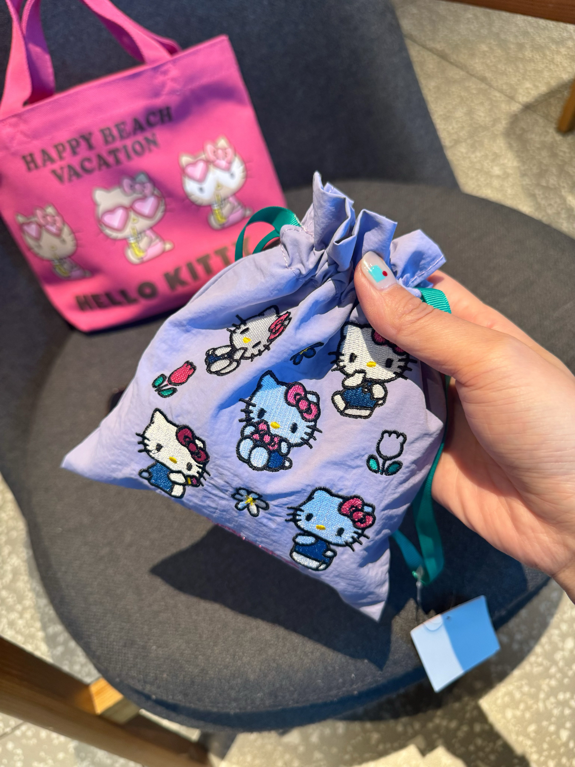 左小西 日系三丽鸥Kitty可爱卡通束口袋紫色刺绣口红零钱收纳包