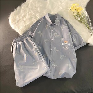 夏季男女1404-1-dk05-C33-p78宽松阔 裤短裤中裤休闲套装货图片