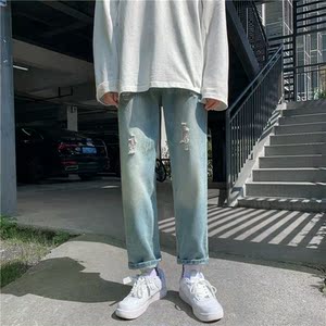 20年男新款港风精品牛仔裤破洞休闲女裤子714M
