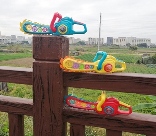 卡通造型电动透明齿轮电锯光头强转动声光音乐玩具礼物儿童斧头