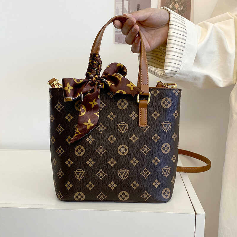 老花托特菜篮子包潮2026新款小众原创轻奢真皮手提单肩斜挎水桶包