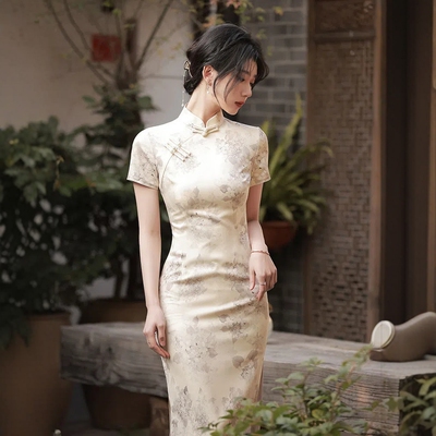 淘宝爆款特价版女装反季亏本清仓特卖旗袍夏季显瘦短袖气质连衣裙