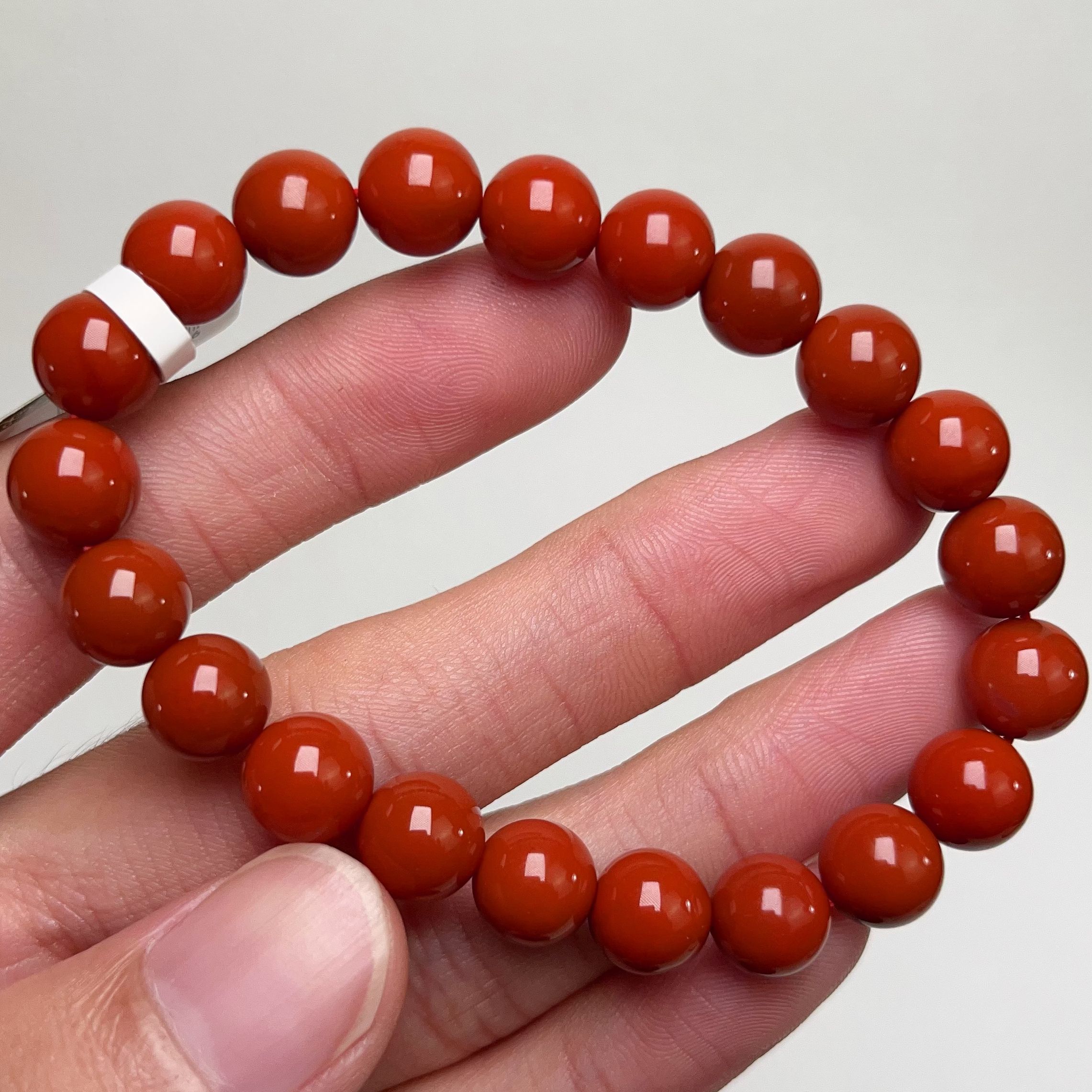 1406C27凉山瓦西料南红正色柿子锦单圈手串