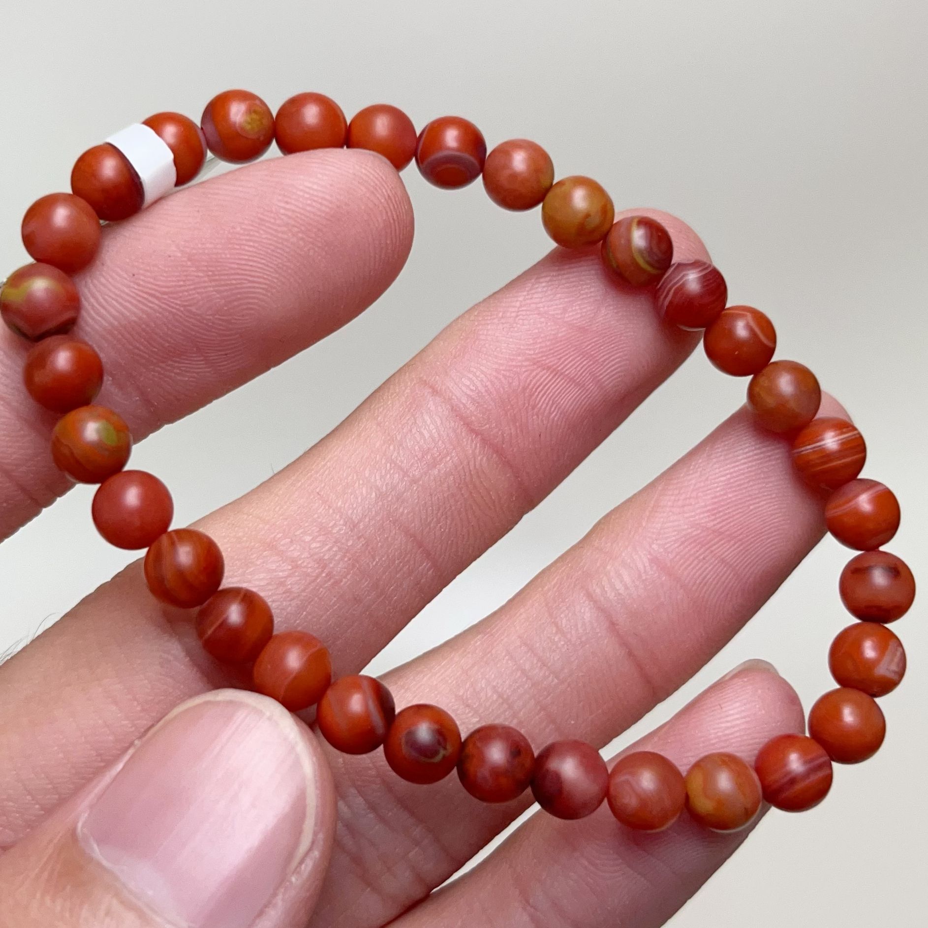 056C19凉山九口料南红包浆单圈手串