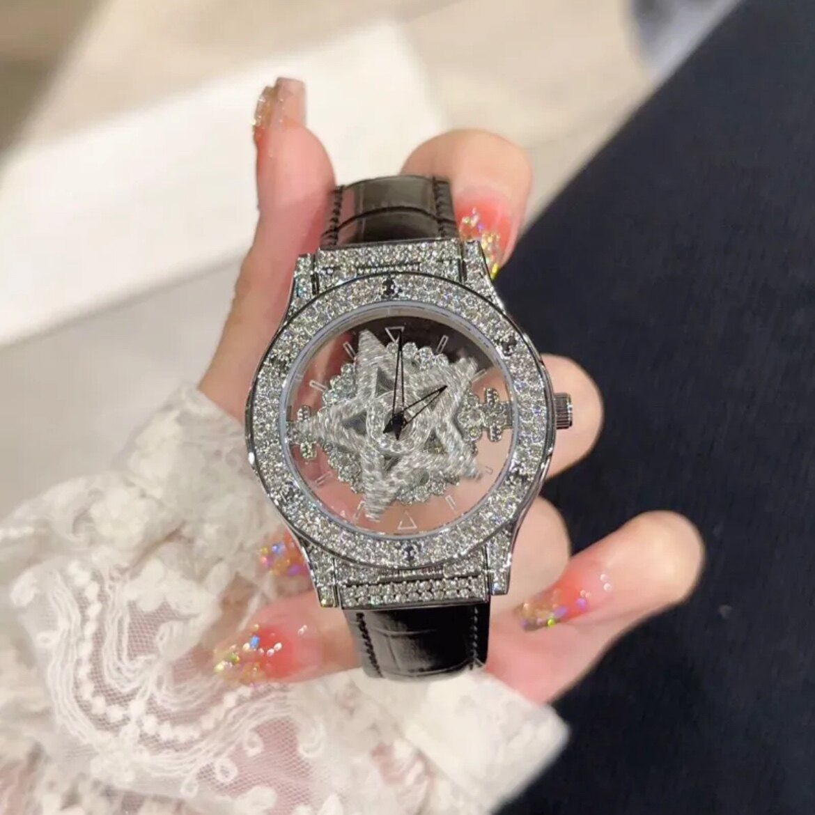 轻奢高级女表时来运转五芒星手表时尚镂空腕表女士女款旋转满天星
