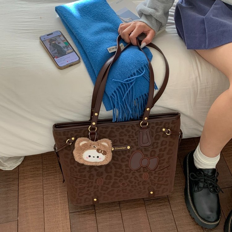 2025冬季新款托特包日常加挂件2025年冬季单肩PU单包车