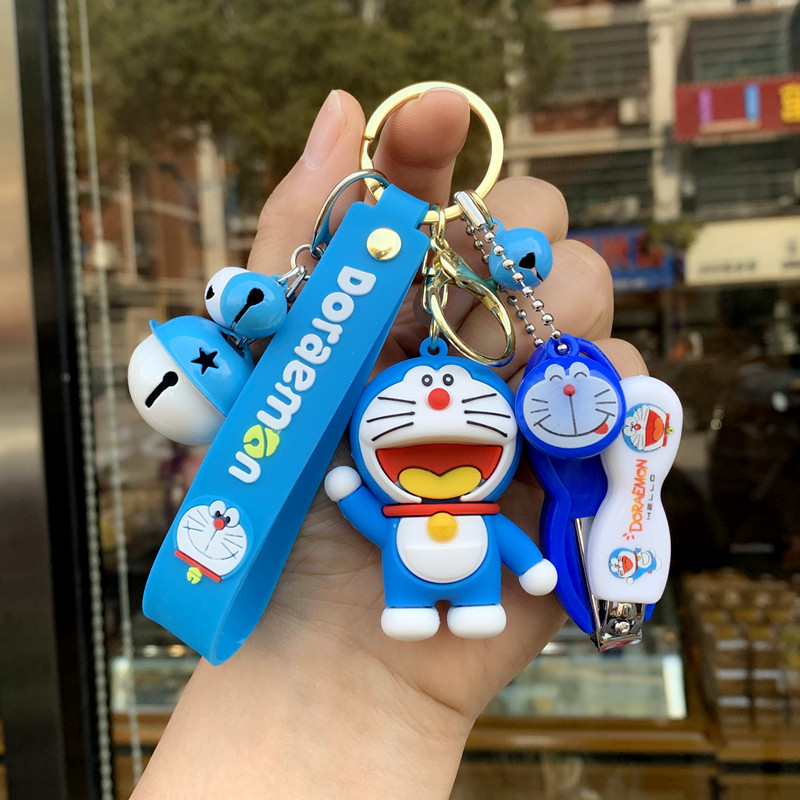 多啦a梦车钥匙扣男女可爱情侣叮当猫创意指甲刀发光猫爪包包挂件