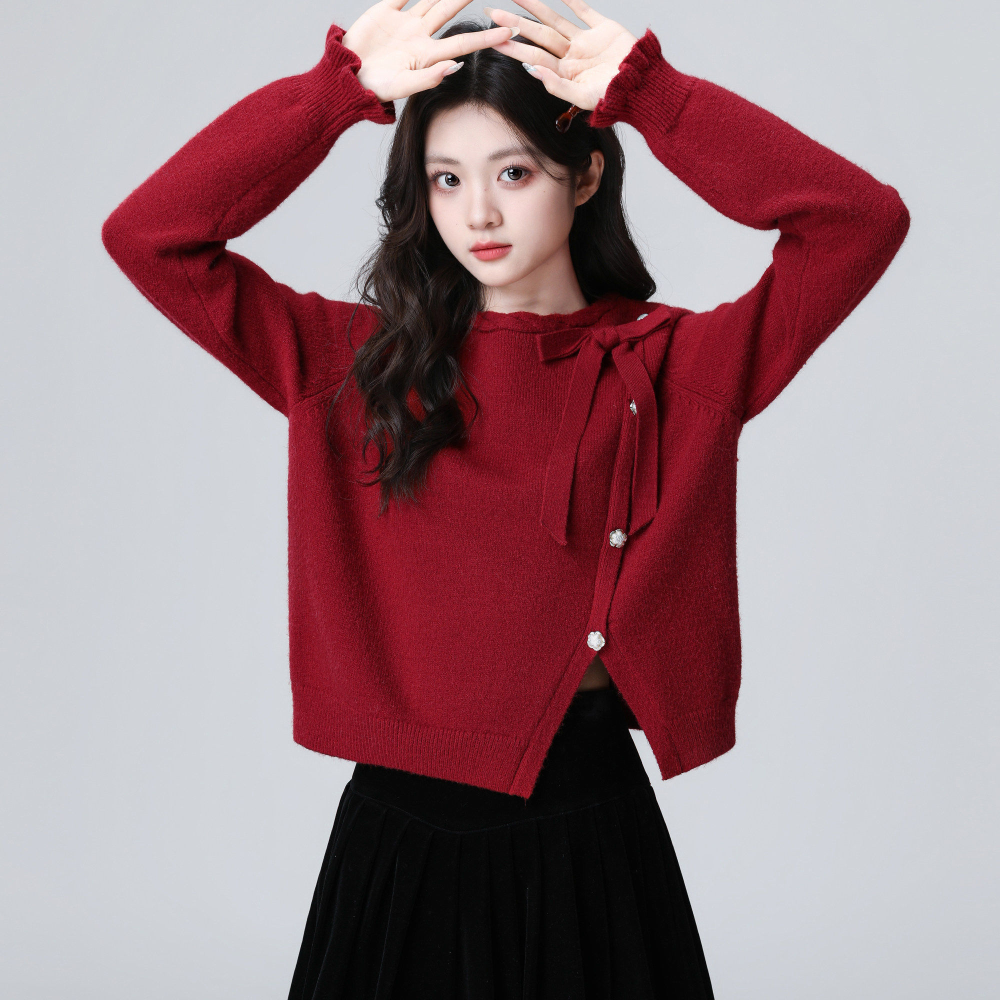红色圆领毛衣女秋冬2026冬季新款蝴蝶结不规则内搭针织衫短款上衣