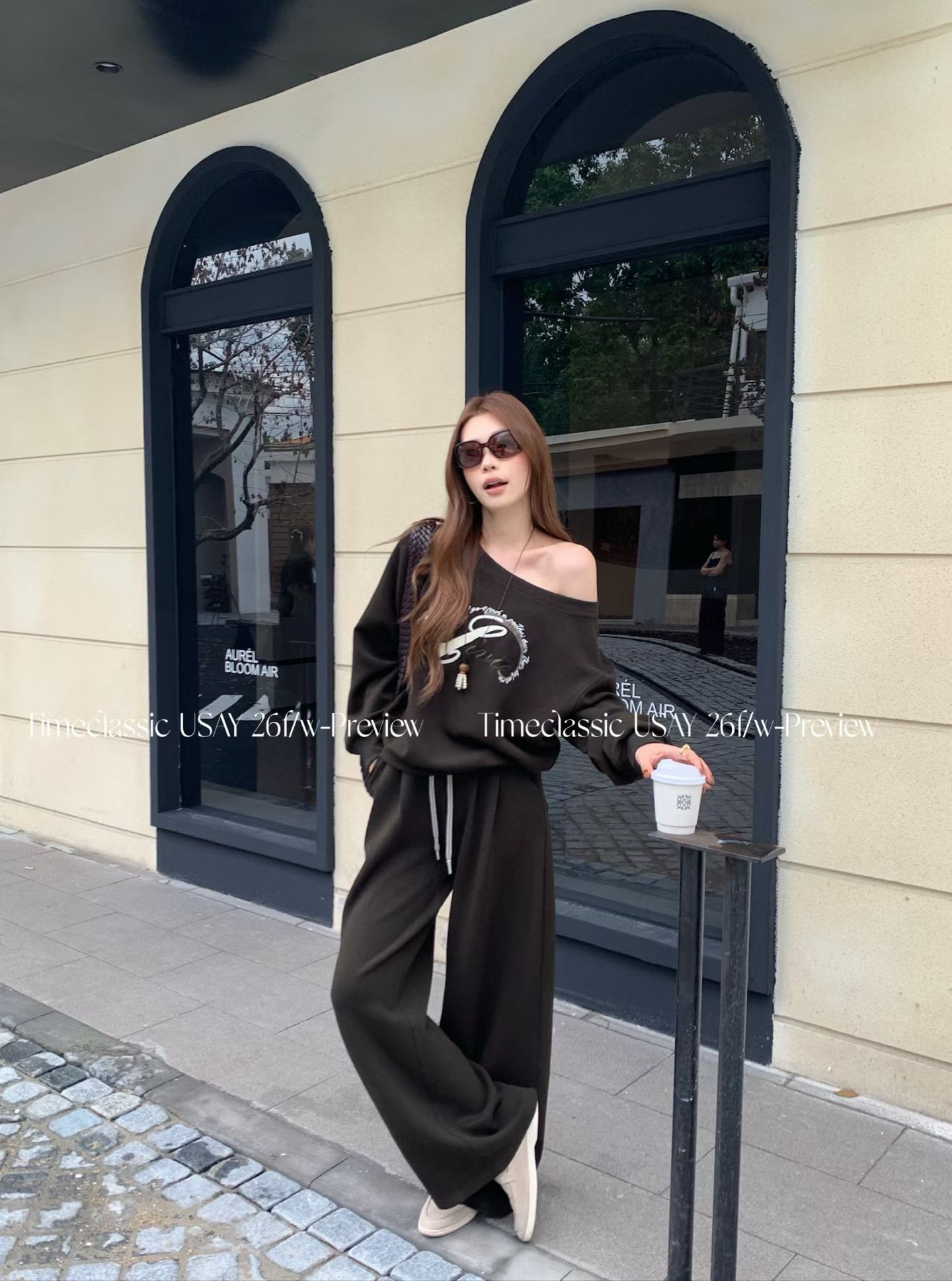 韩系新款时尚高品质设计感斜肩印花卫衣高腰休闲阔腿裤洋气套装女