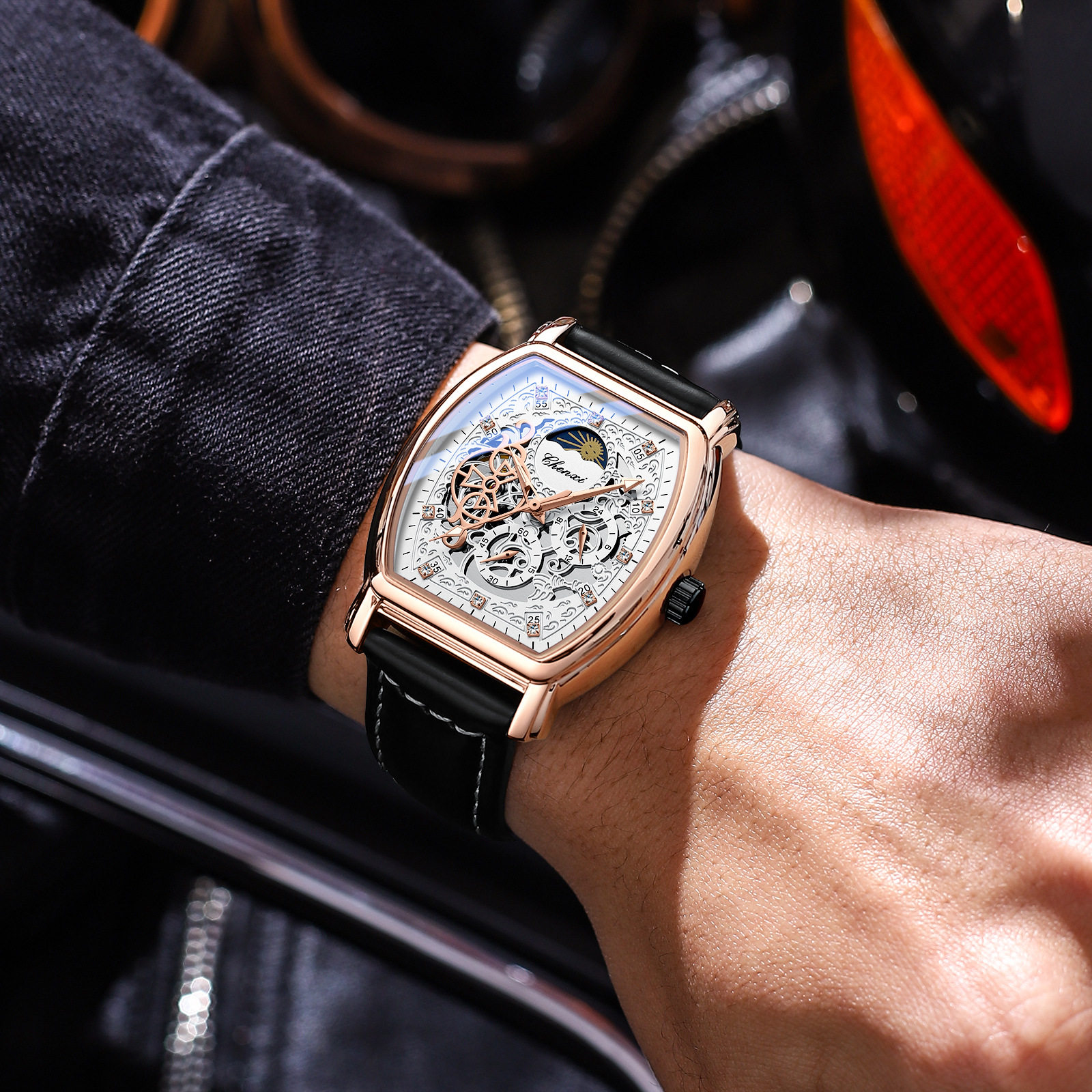 晨曦新款日月星辰酒桶形全自动机械手表男士商务夜光镂空酷潮表