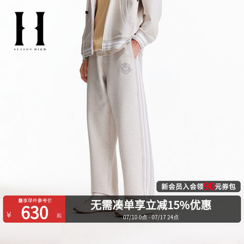 宽松版型，松紧抽绳腰头，双侧拼色织带设计
