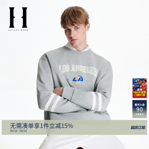 袖部条纹拼接，背部底摆贴布装饰
