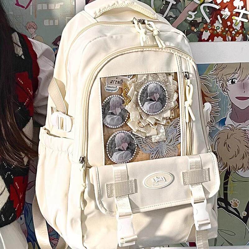 日系痛包双肩初中女生上学学生党吧唧谷子书包二次元大容量小食量