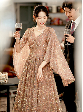 金色晚礼服女高级感气质宴会轻奢小众高端亮片年会主持人演出长款