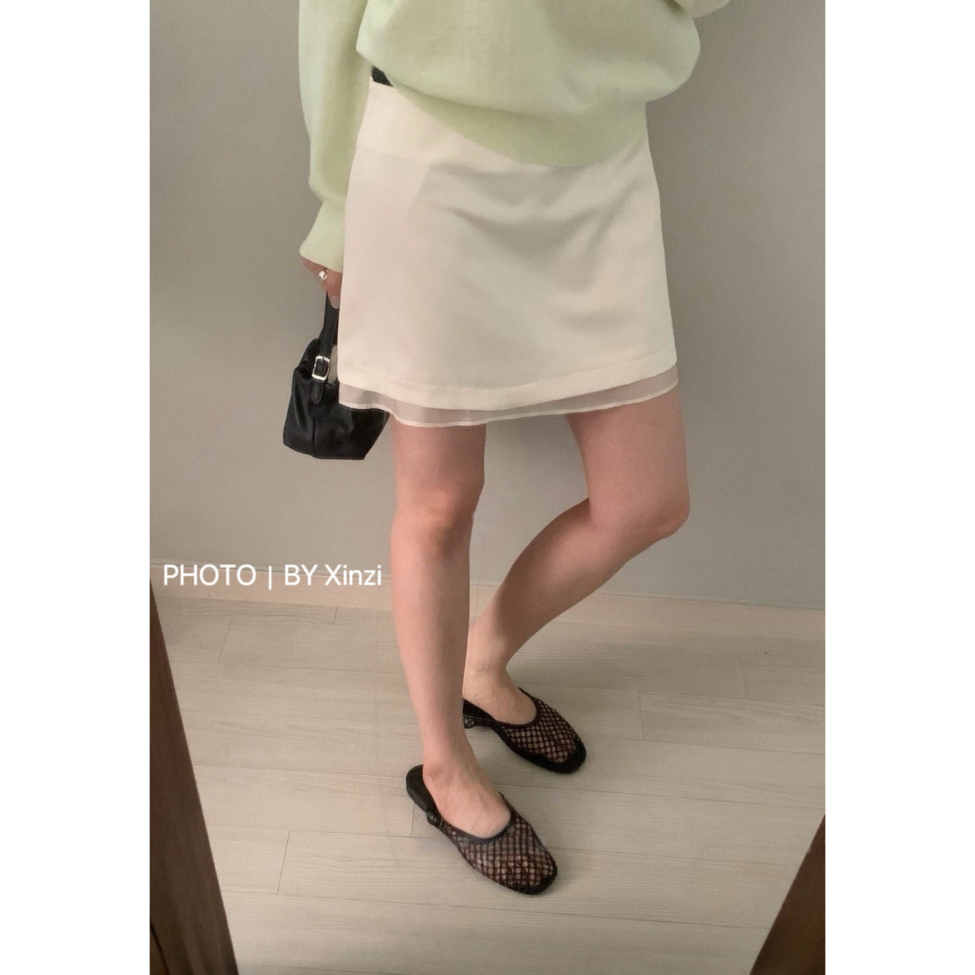 辣妹风高腰A字网纱拼接短裙