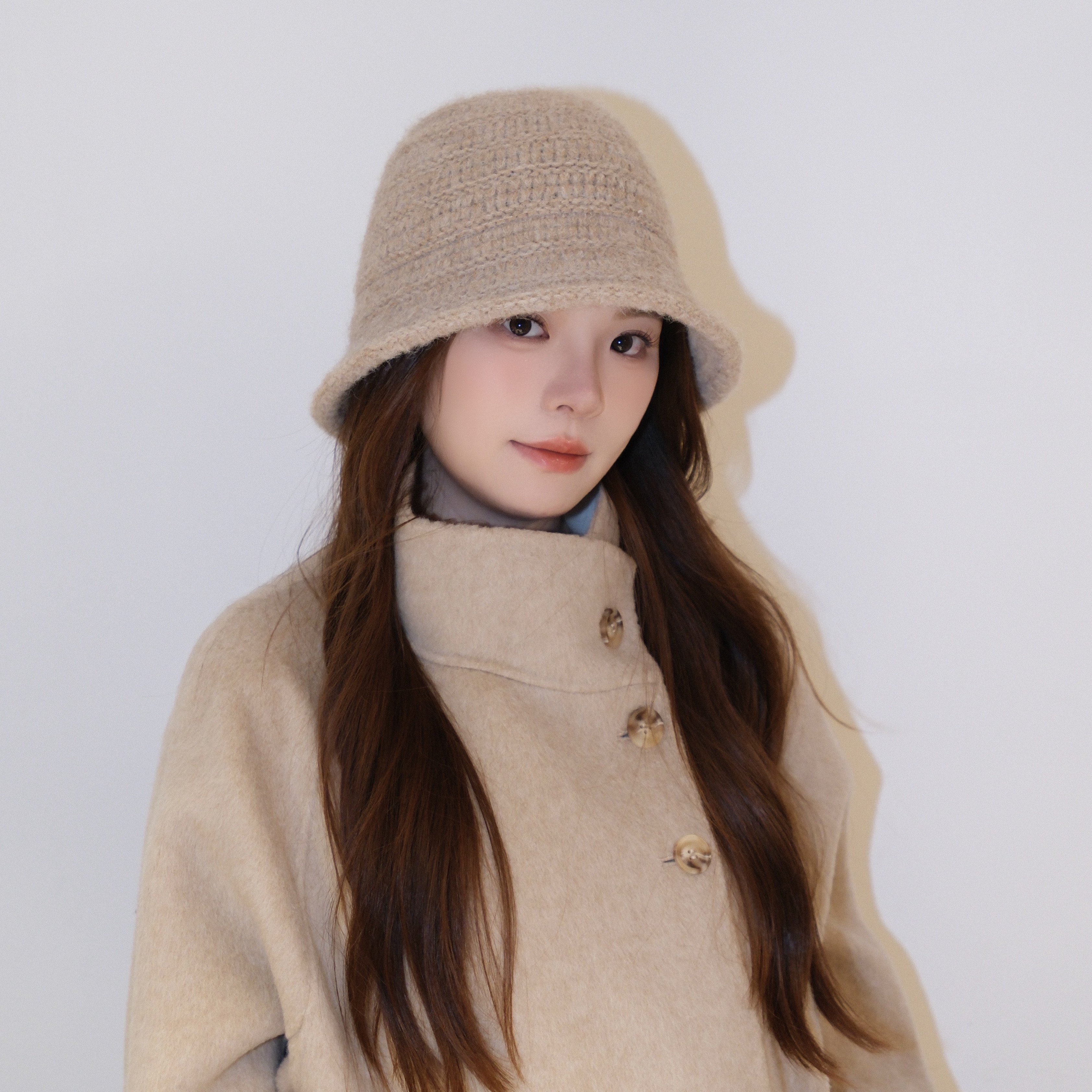 秋冬毛绒保暖后开叉显瘦减龄毛线渔夫帽子女系绳个性休闲针织盆帽