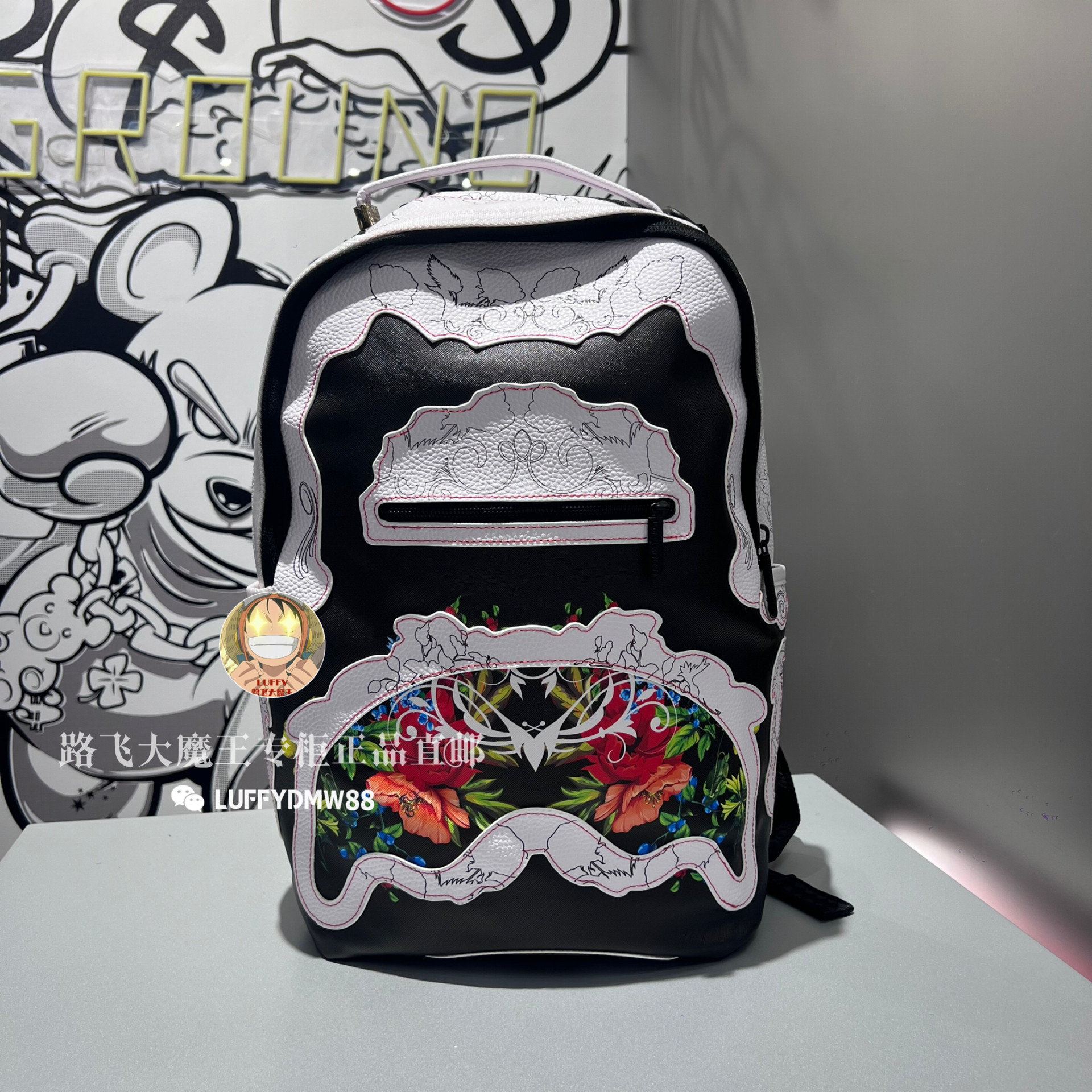 SprayGround专柜正品 黑白双肩包W0915710彩色花卉拼色潮牌男女背