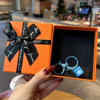 Электронная синяя оранжевая подарочная коробка