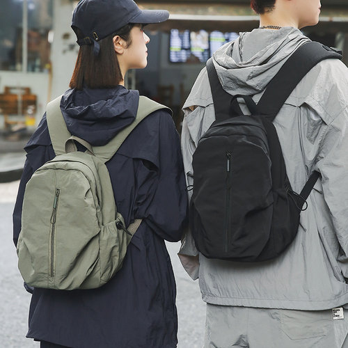 大牙休闲男女双肩包防水背包