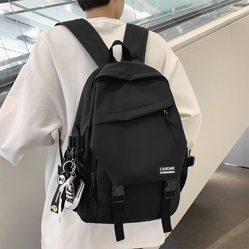 大牙休闲男女通用双肩包