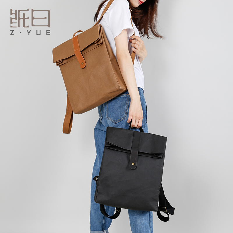原创小众双肩包女男小型双肩背包简约水洗牛皮纸包包轻便小号旅游